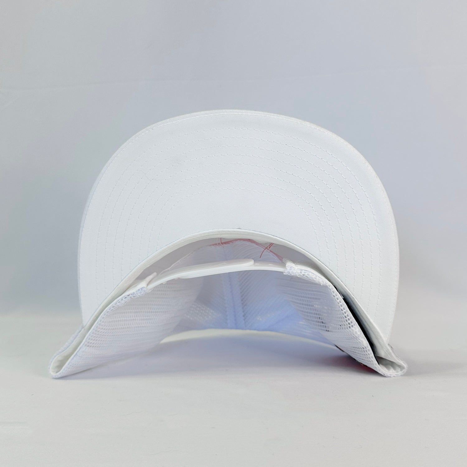 Fresh White Nic Ramsay Racing #07 Trucker Hat, Authentic Yupoong, showing the front logo and full stitching.